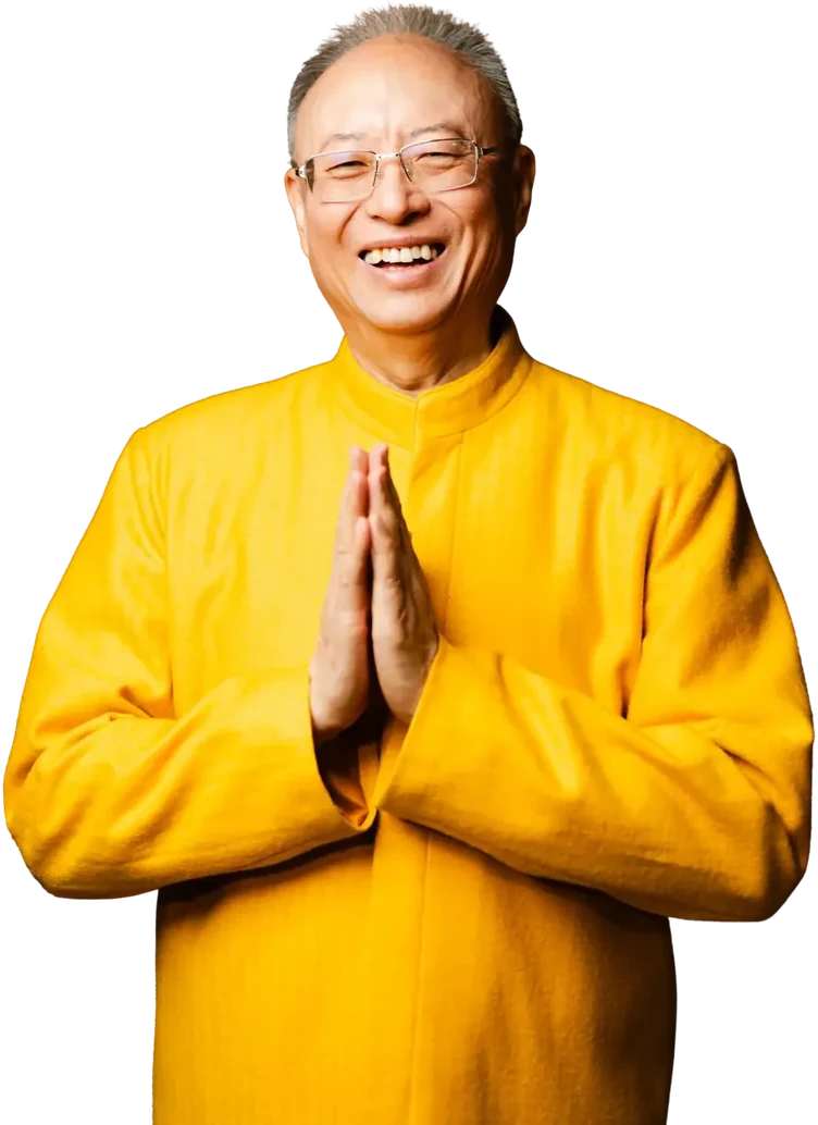 Dr. and Master Zhi Gang Sha with hands in prayer